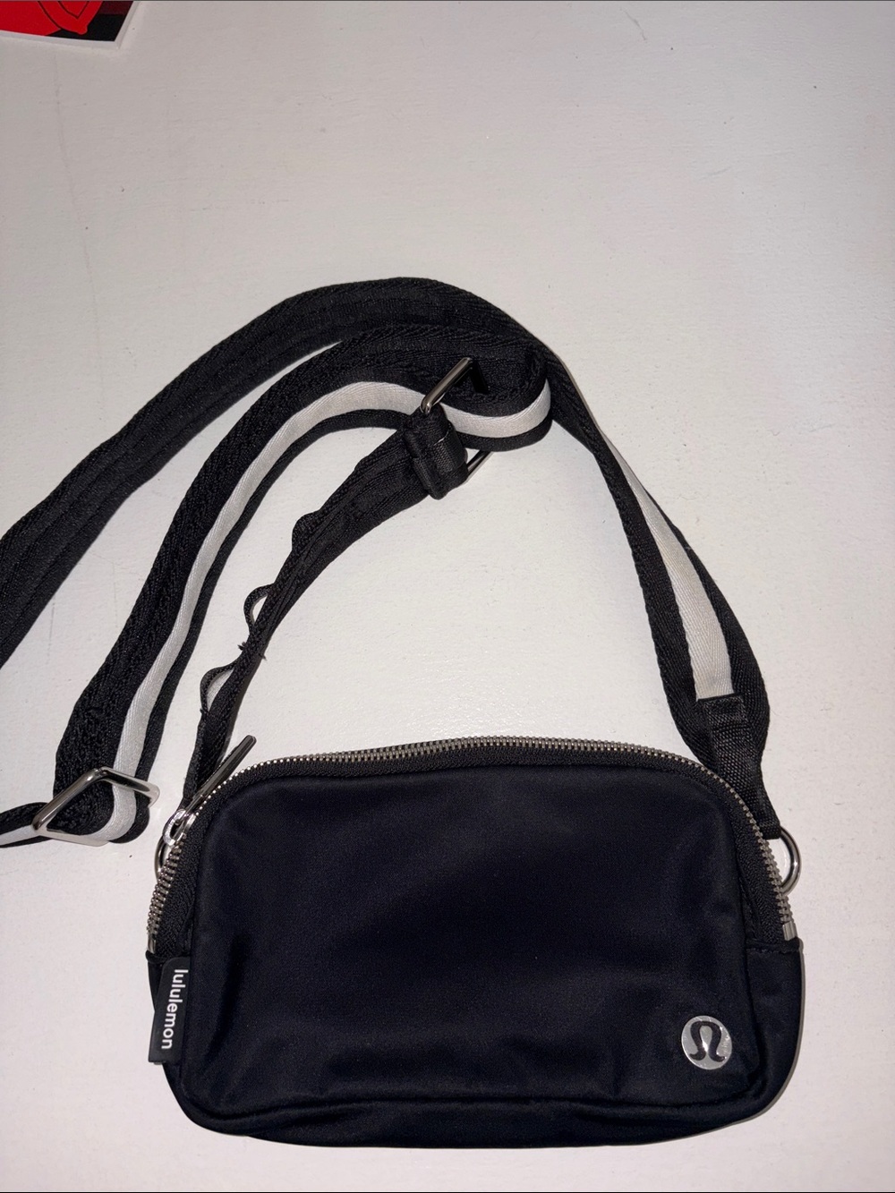 lululemon athletica Black Crossbody Belt Bag with Striped Strap